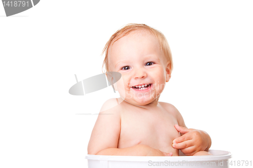 Image of Happy small boy having bath