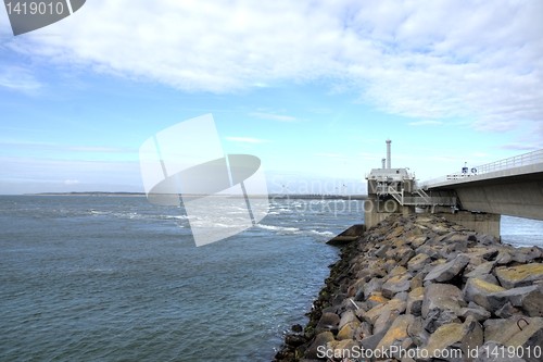 Image of Dam, sea and wind green energy in Zeeland