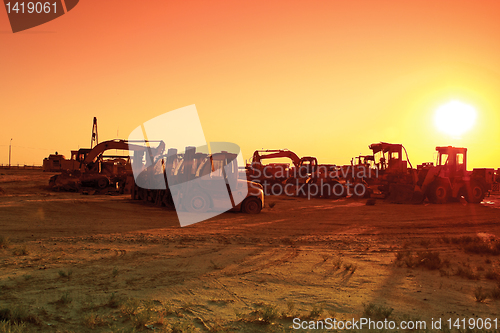 Image of Trucks at sunset.