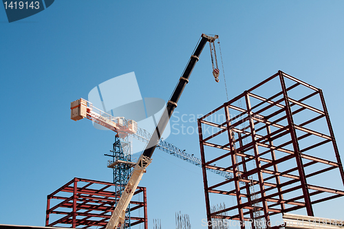 Image of Construction Cranes.