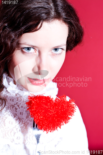 Image of woman with red heart 