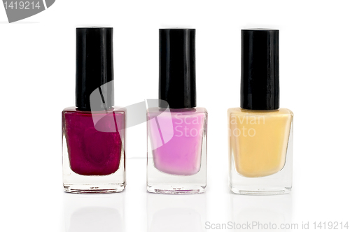 Image of Nail polish bottles in three