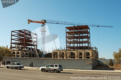 Image of Construction Cranes.