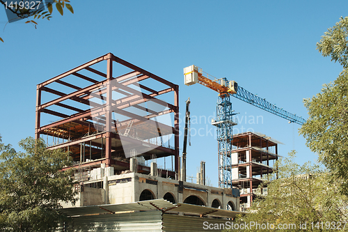 Image of Construction Cranes.