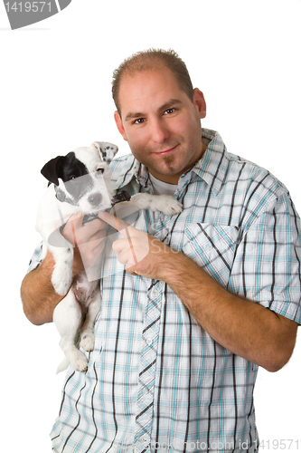 Image of Young man and his puppy