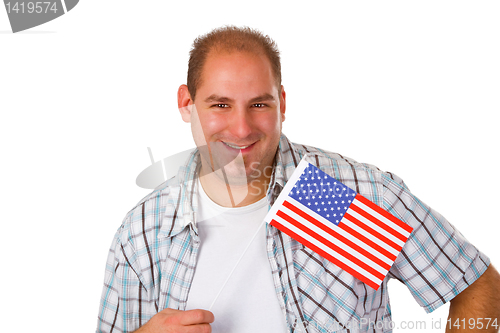 Image of Young man holding American flag