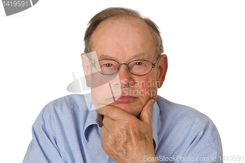 Image of Male senior holding his chin