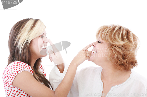 Image of  girl and mother profiles, playful woman with nose daughter play