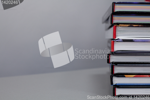 Image of stack of books on the table