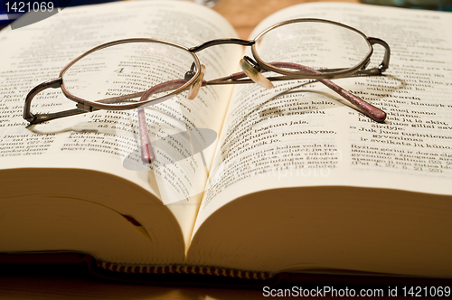 Image of Glasses and book