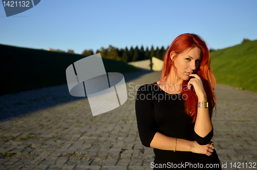 Image of Redhead girl posing