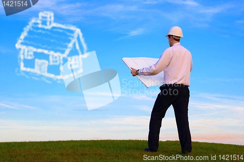 Image of Man with plan and house