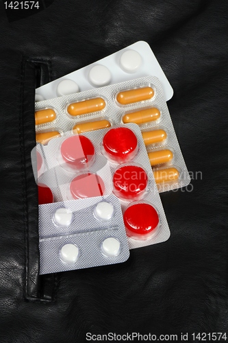 Image of Medicine in jacket pocket
