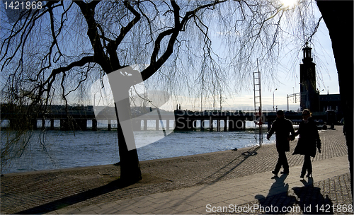 Image of Walking along the water