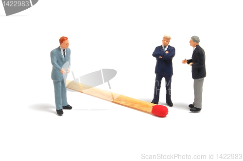 Image of business man and matches on white