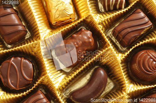 Image of chocolate truffles in a box
