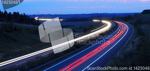 Image of night traffic on highway