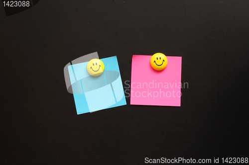 Image of smiley and paper with copyspace