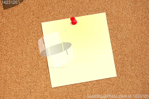 Image of blank sheet of paper on bulletin board