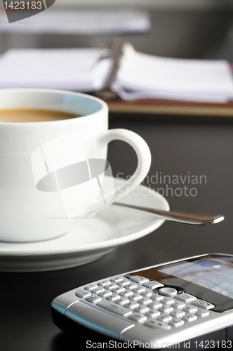 Image of cup of coffee in the office