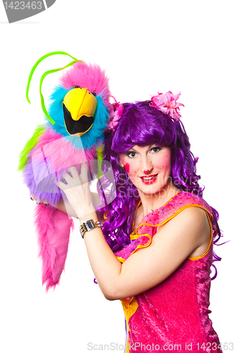 Image of female clown with colorful toy bird