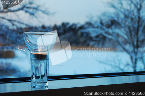 Image of Candle on a window-sill 