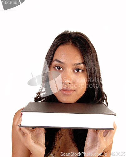 Image of Woman holding a book.