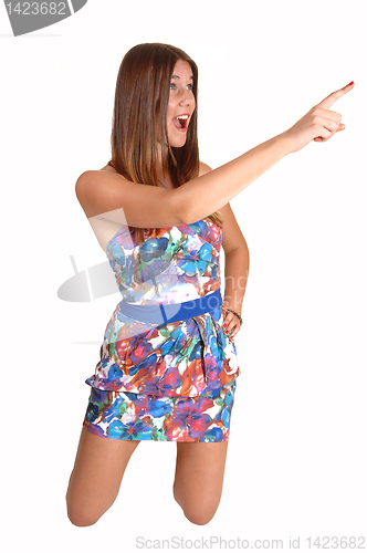 Image of Girl pointing with her finger.