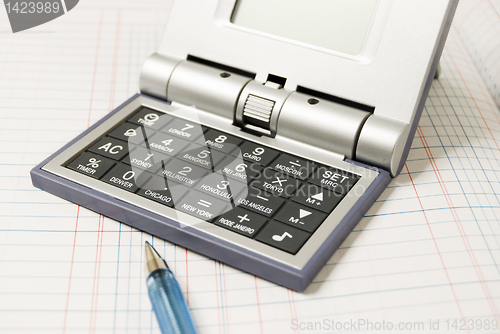 Image of Calculator and Ballpen