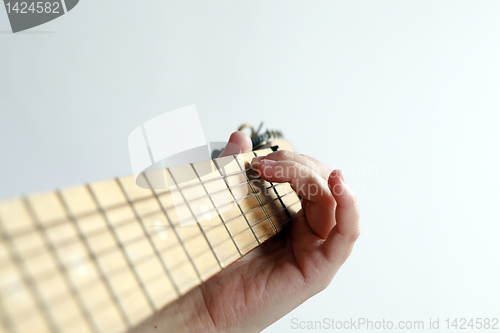Image of Playing the guitar
