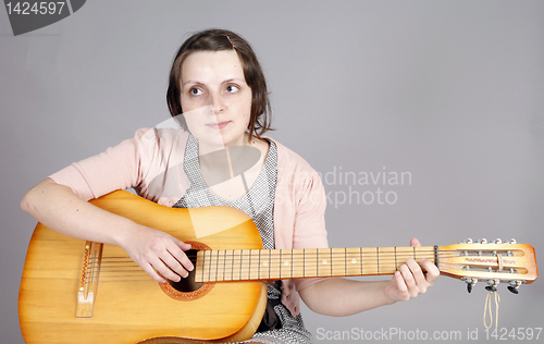 Image of Playing the guitar