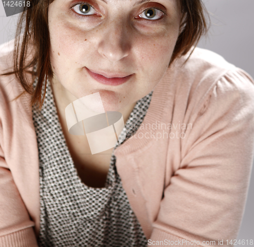 Image of Portret of a young happy woman