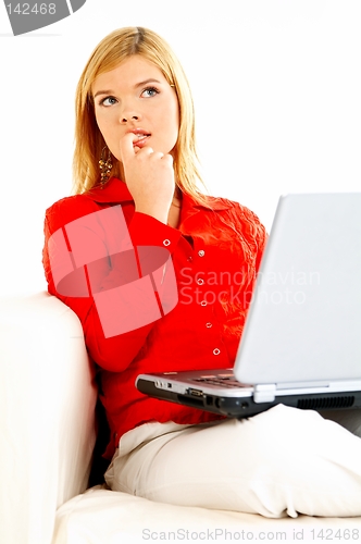 Image of Women with laptop on couch