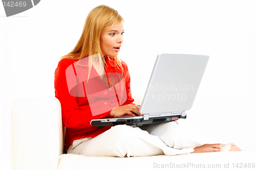 Image of Women with laptop on couch