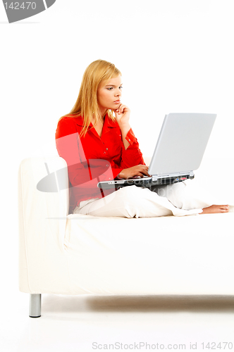 Image of Women with laptop on couch