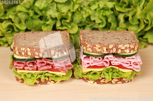 Image of Sandwiches with salami and ham
