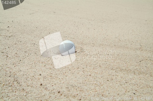 Image of Golf-ball in bunker