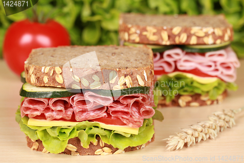 Image of Sandwiches with salami and ham