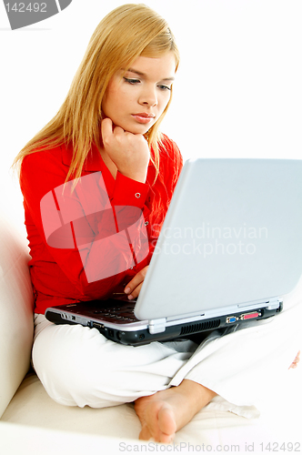 Image of Women with laptop on couch