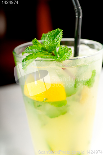 Image of mojito caipirina cocktail with fresh mint leaves