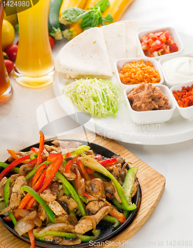 Image of original fajita sizzling hot  on iron plate