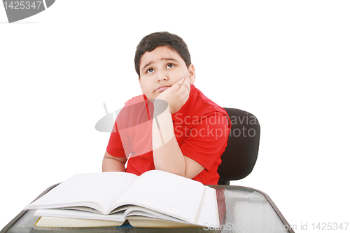 Image of Portrait of a stressed young student with a of books to read. 