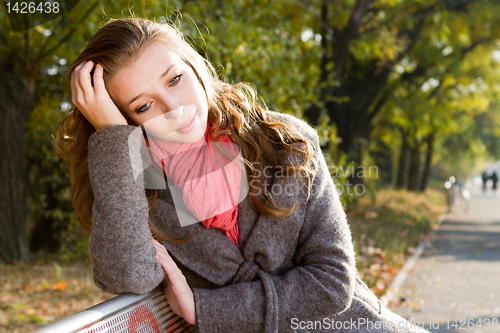 Image of Thoughtful  girl on a bench