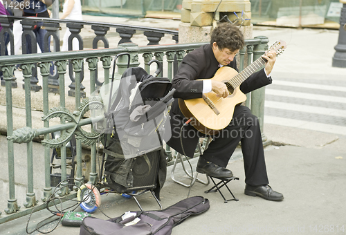 Image of The street musician