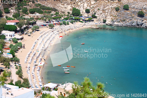 Image of View from above of the main beach in Lindos, Rhodes, one of the 