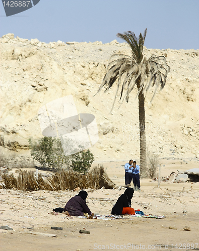 Image of Arabian women and police