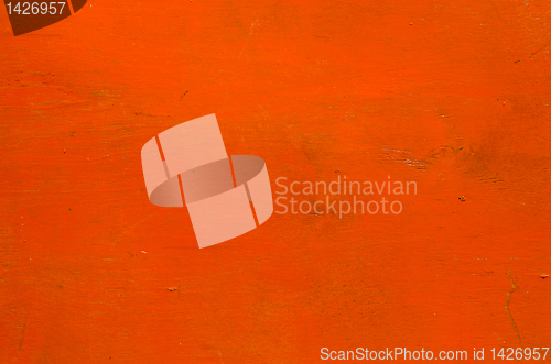 Image of Wooden plank orange color paint background.
