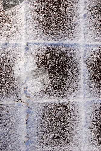 Image of Snow-covered tiles 