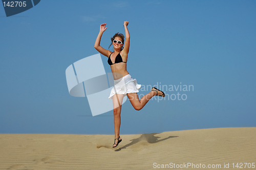 Image of Jumping in the desert