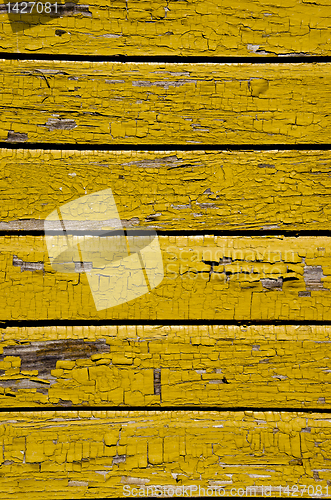 Image of Ancient wooden wall with peeling paint background.